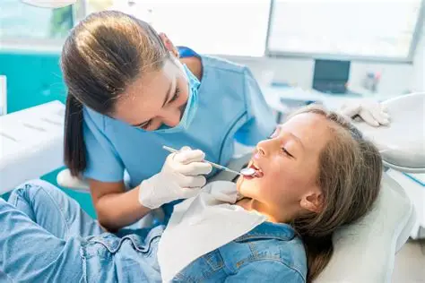 Pediatric dentist providing gentle dental care for children